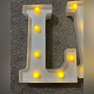 White Letter L, I, V, E with Yellow Lights 👌🏻